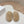 MULES ATTACHED TRIANGLE LOGO IN BEIGE SHEARLING