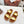 TWO-STRAP SANDALS IN GOLD CALFSKIN