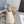 LOE MINI PEBBLE 20 BUCKET BAG IN WHITE GRAINED CALFSKIN