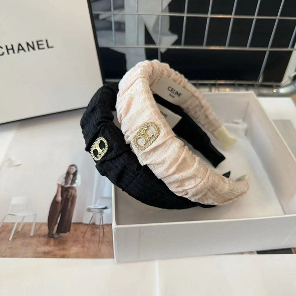 BLACK FABRIC WITH GOLD LOGO HAIRBAND 414448