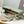 capucines mm 31.5 green beige taurillon leather gold hardware