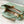 capucines bb 27 green beige taurillon leather gold hardware