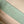 capucines mini 21 green beige taurillon leather gold hardware