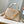 CAPUCINES BB 27CM BEIGE TAURILLON LEATHER