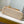 CAPUCINES BB 27CM BEIGE TAURILLON LEATHER