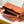 CAPUCINES GM 38CM BROWN ORANGE TAURILLON LEATHER