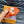 LV SLIPPERS IN CARROT ORANGE MONOGRAM CALFSKIN