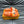 LV SLIPPERS IN CARROT ORANGE MONOGRAM CALFSKIN