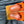LV OASIS MULE IN CARROT ORANGE CALFSKIN