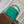 CAPUCINES MINI 21 GREEN CROCODILE EMBOSSED CALFSKIN GOLD HARDWARE
