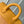 STEAMER 18 IN PEPPER ORANGE MONOGRAM HERITAGE CANVAS GOLD HARDWARE