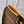GASTON WEARABLE WALLET 18 IN BROWN MONOGRAM CANVAS MIX YELLOW CALFSKIN