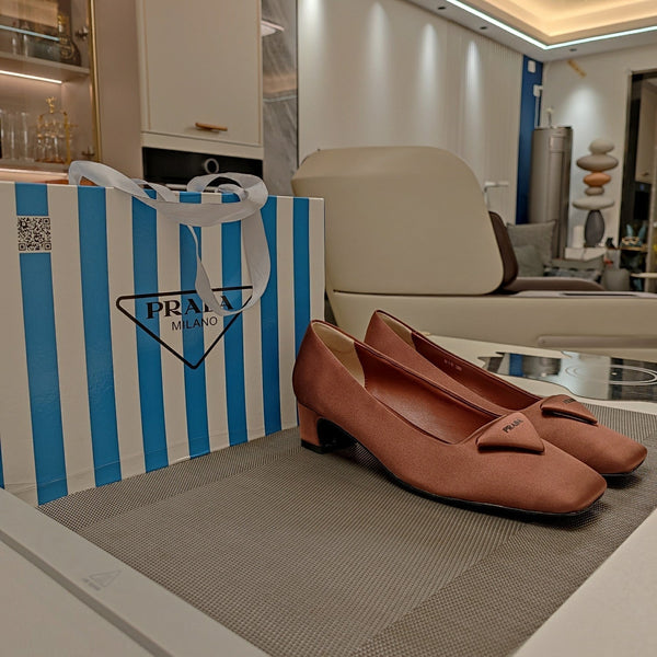 TRIANGLE LOGO PUMPS IN CHESTNUT BROWN SATIN