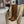 KNEE BOOTS WITH TRIANGLE LOGO IN CAMEL SUEDE
