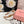 HEADBAND WITH GARNITURE PRINT IN TIGER EYE ORANGE SILK 432822