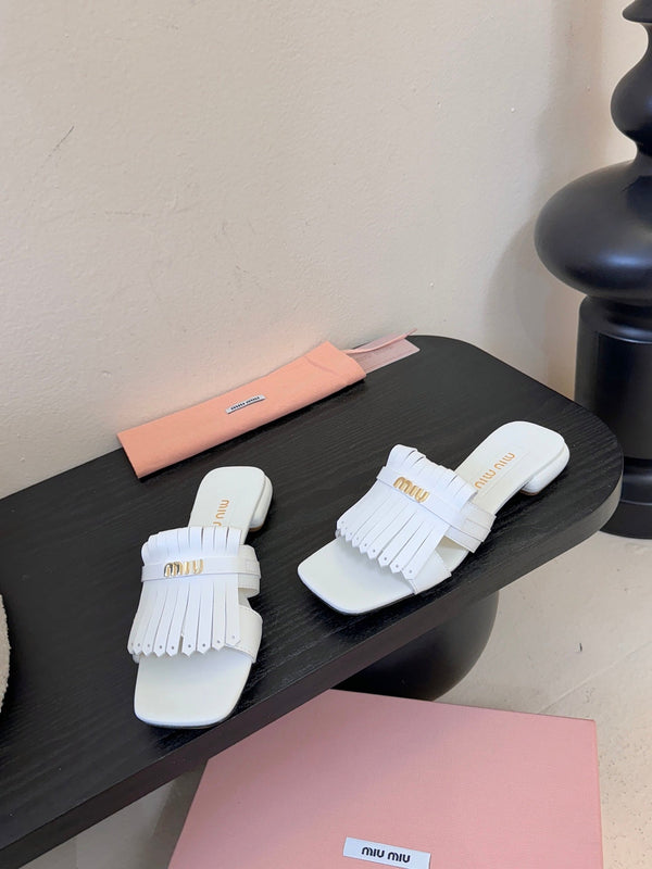 Miu 26s Flat Slippers In White Calfskin