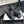 cross puffy slipper black lycra fabric