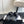 cross puffy slipper black lycra fabric
