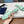 PRA SAFFIANO PATENT SLIDES OSTRICH MOTIF SEAFOAM CALFSKIN