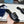 PRA SAFFIANO PATENT SLIDES OSTRICH MOTIF BLACK CALFSKIN