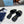 PRA SAFFIANO PATENT SLIDES OSTRICH MOTIF BLACK CALFSKIN