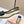 Miu Pointed-Toe Ballet Flats Beige Black Sheepskin 591562