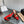 ALAIA AZZEDINE HIGH HEELS IN CHERRY RED CALFSKIN WITH GOLD HARDWARE