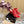 ALAIA ELASTIC CAGE MULE SANDALS IN CHERRY RED WOVEN STRAP AND LAMBSKIN