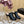 ALAIA ELASTIC CAGE MULE SANDALS IN BLACK WOVEN STRAP AND LAMBSKIN