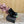 GREEN GEM-STUDDED HIGH PUMPS IN BLACK PATENT CALFSKIN