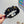 BLACK FABRIC WITH GOLD LOGO HAIRBAND 415931