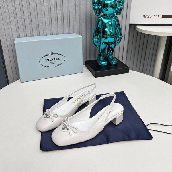 Prad 26s Round Toe Slingback Pumps 40mm In White Calfskin With Bow