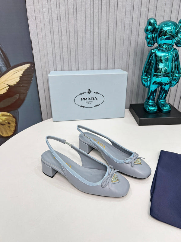 Prad 26s Round Toe Slingback Pumps 40mm In Light Blue Calfskin With Bow