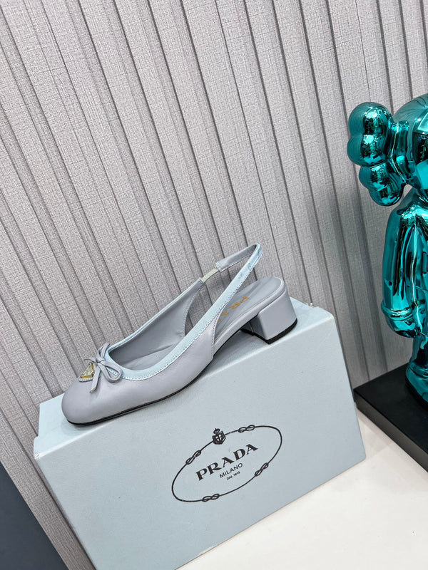 Prad 26s Round Toe Slingback Pumps 40mm In Light Blue Calfskin With Bow