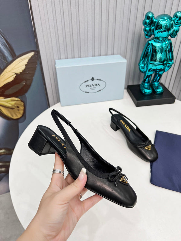 Prad 26s Round Toe Slingback Pumps 40mm In Black Calfskin With Bow