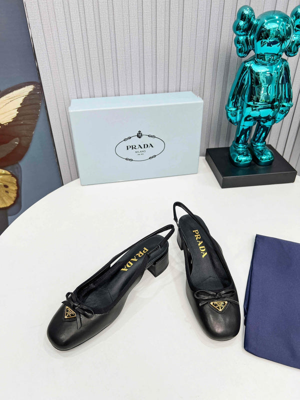 Prad 26s Round Toe Slingback Pumps 40mm In Black Calfskin With Bow
