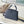 CAPUCINES EAST-WEST 27 IN BLACK TAURILLON
