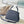 CAPUCINES EAST-WEST 27 IN BLACK TAURILLON