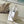 CAPUCINES EAST-WEST MINI 21 IN WHITE TAURILLON