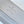 CAPUCINES EAST-WEST MINI 21 IN WHITE TAURILLON