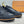 LV TRAINERS IN BLACK CALFSKIN AND JACQUARD