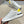 LV TRAINERS IN WHITE CALFSKIN AND JACQUARD