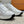 LV TRAINERS IN WHITE CALFSKIN AND JACQUARD