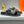 HM Oran H Noir Buckle Slippers in Gray Cowhide 735242