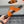 HM Oran H Black Gold Buckle Slippers in Orange  Cowhide 735253