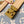 SIDE TRUNK 21 IN GRAY CREAM MONOGRAM TRIANON CANVAS GOLD HARDWARE