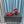 CC CAMELLIA SANDAL IN CHERRY RED SUEDE AND BLACK CALFSKIN WITH FLOWER