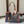 CABAS 37 IN BLACK TRIOMPHE CANVAS AND BRONZE BROWN CALFSKIN TRIM GOLD LOCK