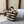STRIPED COUFFIN CLASSIC PANIER 22 IN BEIGE AND BLACK RAFFIA AND CALFSKIN TRIM