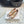 Hangisi 70 Rose Gold Metallic Leather Jewel Buckle Pumps 912618